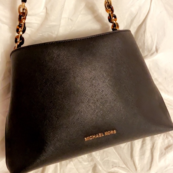 Michael Kors black handbag w/gold finish. Has a long attachable shoulder strap. - Picture 2 of 7
